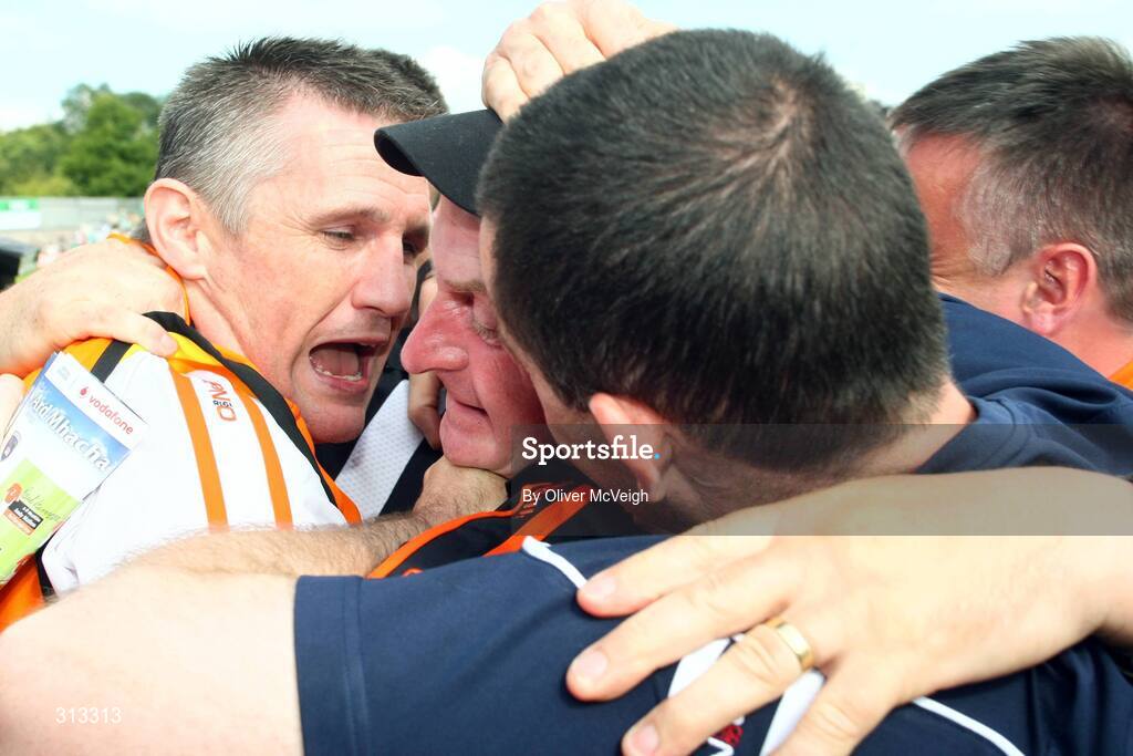 27 July 2008; Armagh manager Peter McDonnell, centre, celebrates with his selectors Benny O'Kane, left, and Denis Holywood at the final whistle. GAA Football Ulster Senior Championship Final replay, Armagh v Fermanagh, St Tighearnach's Park, Clones, Co. Monaghan. Picture credit: Oliver McVeigh / SPORTSFILE *** Local Caption *** S0807107 Armagh v Fermanagh OMcV