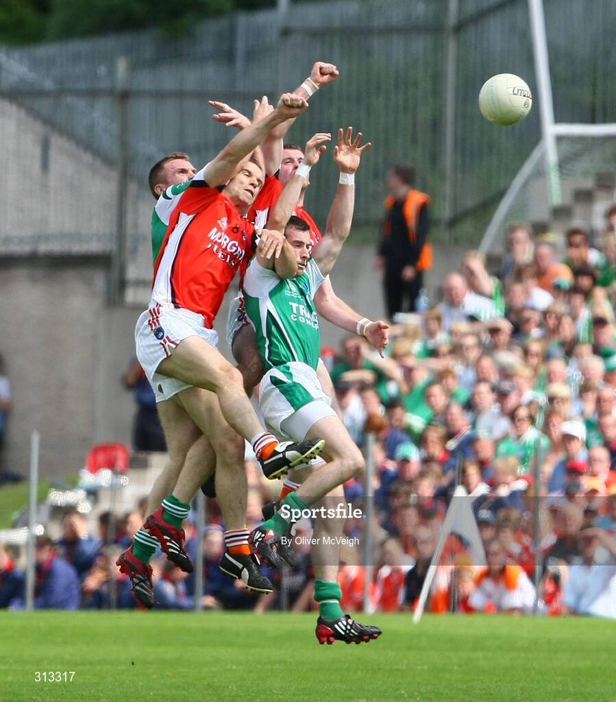 27 July 2008; Martin McGrath and Mark Murphy, Fermanagh, in action against Paul McGrane and Kieran Toner, Armagh. GAA Football Ulster Senior Championship Final replay, Armagh v Fermanagh, St Tighearnach's Park, Clones, Co. Monaghan. Picture credit: Oliver McVeigh / SPORTSFILE *** Local Caption *** S0807107 Armagh v Fermanagh OMcV