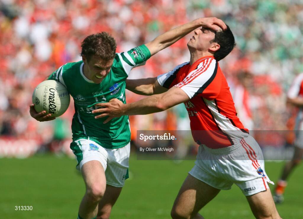 27 July 2008; Eamon Maguire, Fermanagh, in action against Aaron Kernan, Armagh. GAA Football Ulster Senior Championship Final replay, Armagh v Fermanagh, St Tighearnach's Park, Clones, Co. Monaghan. Picture credit: Oliver McVeigh / SPORTSFILE *** Local Caption *** S0807107 Armagh v Fermanagh OMcV