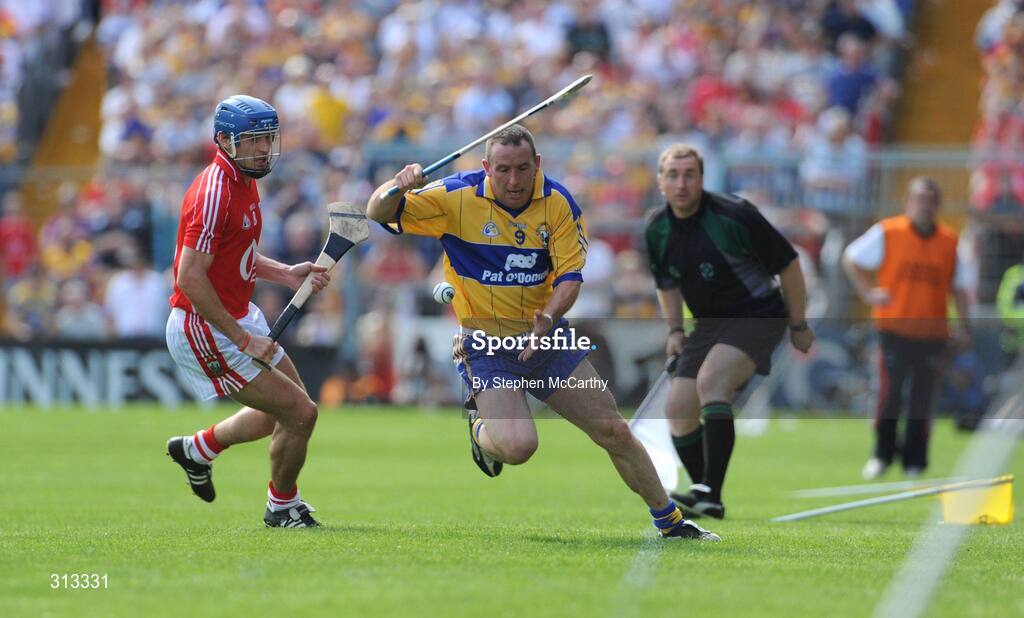 27 July 2008; Colin Lynch, Clare, in action against Tom Kenny, Cork. GAA Hurling All-Ireland Senior Championship Quarter-Final, Clare v Cork, Semple Stadium, Thurles, Co. Tipperary. Picture credit: Stephen McCarthy / SPORTSFILE