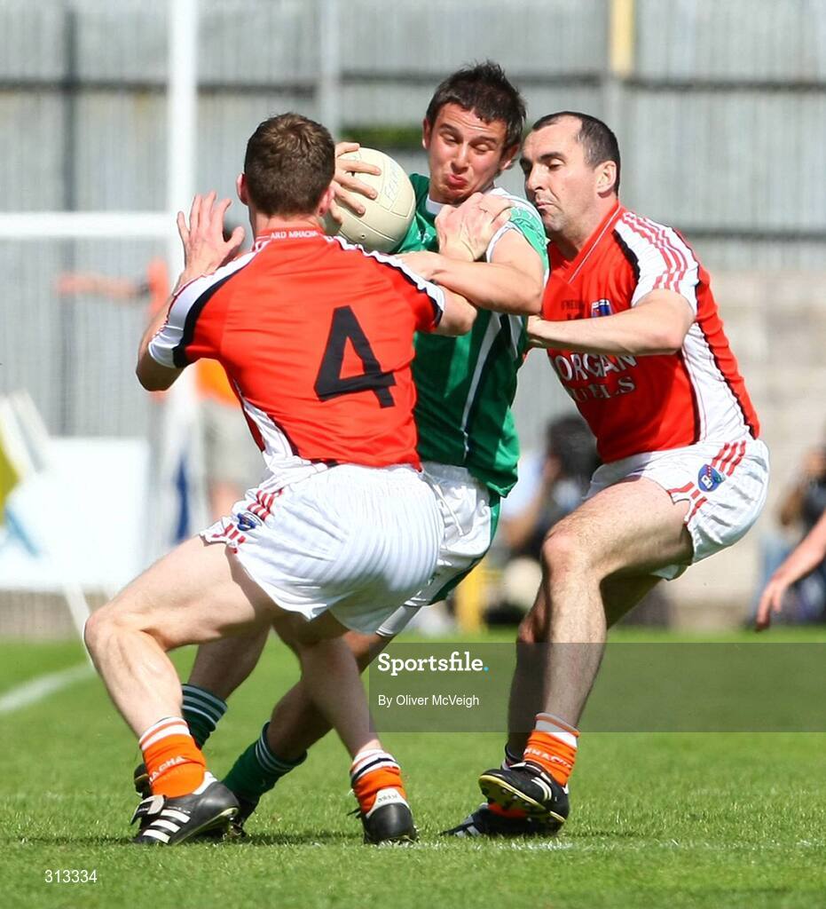27 July 2008; Shane McCabe, Fermanagh, in action against Finnian Moriarty and Martin O'Rourke, Armagh. GAA Football Ulster Senior Championship Final replay, Armagh v Fermanagh, St Tighearnach's Park, Clones, Co. Monaghan. Picture credit: Oliver McVeigh / SPORTSFILE *** Local Caption *** S0807107 Armagh v Fermanagh OMcV