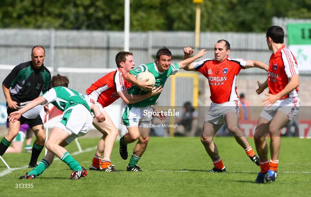 27 July 2008; Shane McCabe, Fermanagh, in action against Finnian Moriarty and Martin O'Rourke, Armagh. GAA Football Ulster Senior Championship Final replay, Armagh v Fermanagh, St Tighearnach's Park, Clones, Co. Monaghan. Picture credit: Oliver McVeigh / SPORTSFILE *** Local Caption *** S0807107 Armagh v Fermanagh OMcV