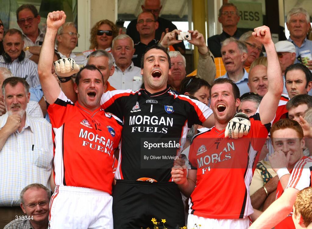 27 July 2008; Armagh's Steven McDonnell, Paul Hearty and Ciaran McKeever celebrate after the game. GAA Football Ulster Senior Championship Final replay, Armagh v Fermanagh, St Tighearnach's Park, Clones, Co. Monaghan. Picture credit: Oliver McVeigh / SPORTSFILE *** Local Caption *** S0807107 Armagh v Fermanagh OMcV