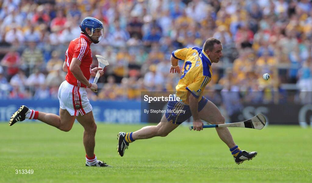 27 July 2008; Colin Lynch, Clare, in action against Tom Kenny, Cork. GAA Hurling All-Ireland Senior Championship Quarter-Final, Clare v Cork, Semple Stadium, Thurles, Co. Tipperary. Picture credit: Stephen McCarthy / SPORTSFIL