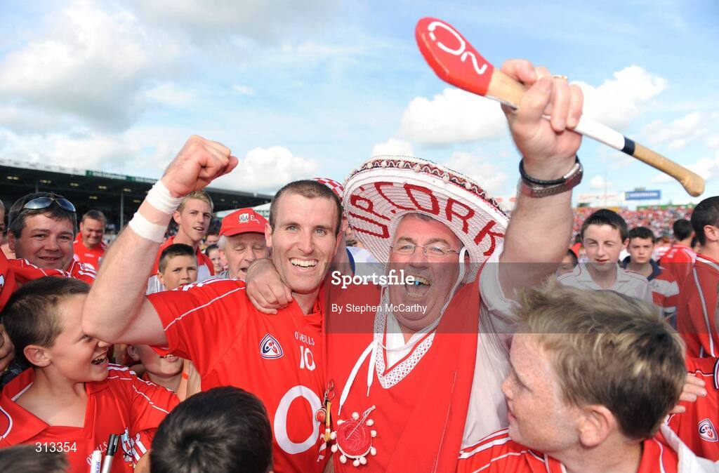 27 July 2008; Ben O'Connor, Cork, is congratulated by Cork supporter Cyril Kavanagh after the match. GAA Hurling All-Ireland Senior Championship Quarter-Final, Clare v Cork, Semple Stadium, Thurles, Co. Tipperary. Picture credit: Stephen McCarthy / SPORTSFILE