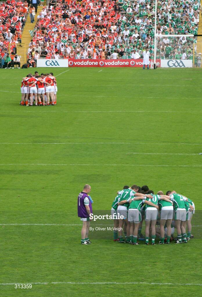 27 July 2008; The Armagh and Fermanagh teams form huddles before the game. GAA Football Ulster Senior Championship Final replay, Armagh v Fermanagh, St Tighearnach's Park, Clones, Co. Monaghan. Picture credit: Oliver McVeigh / SPORTSFILE *** Local Caption *** S0807107 Armagh v Fermanagh OMcV