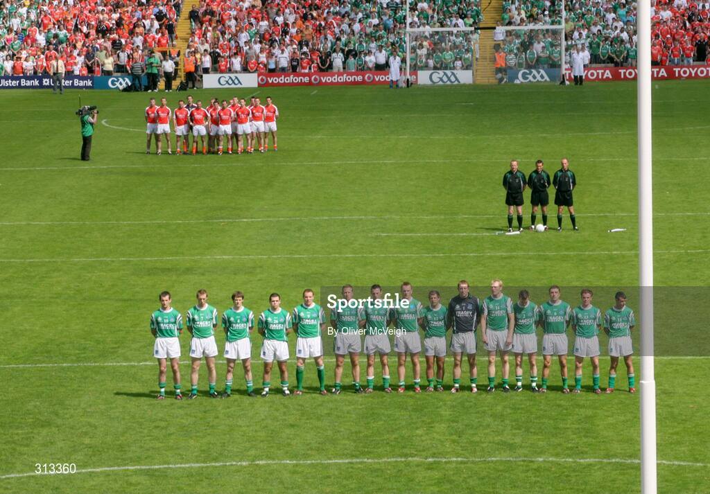 27 July 2008; The Armagh and Fermanagh teams stand for the national anthem. GAA Football Ulster Senior Championship Final replay, Armagh v Fermanagh, St Tighearnach's Park, Clones, Co. Monaghan. Picture credit: Oliver McVeigh / SPORTSFILE