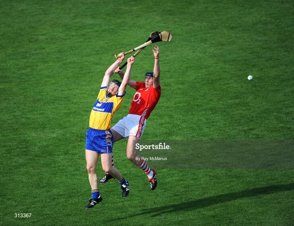 27 July 2008; Niall Gilligan, Clare, in action against John Gardiner, Cork. GAA Hurling All-Ireland Senior Championship Quarter-Final, Clare v Cork, Semple Stadium, Thurles, Co. Tipperary. Picture credit: Ray McManus / SPORTSFILE