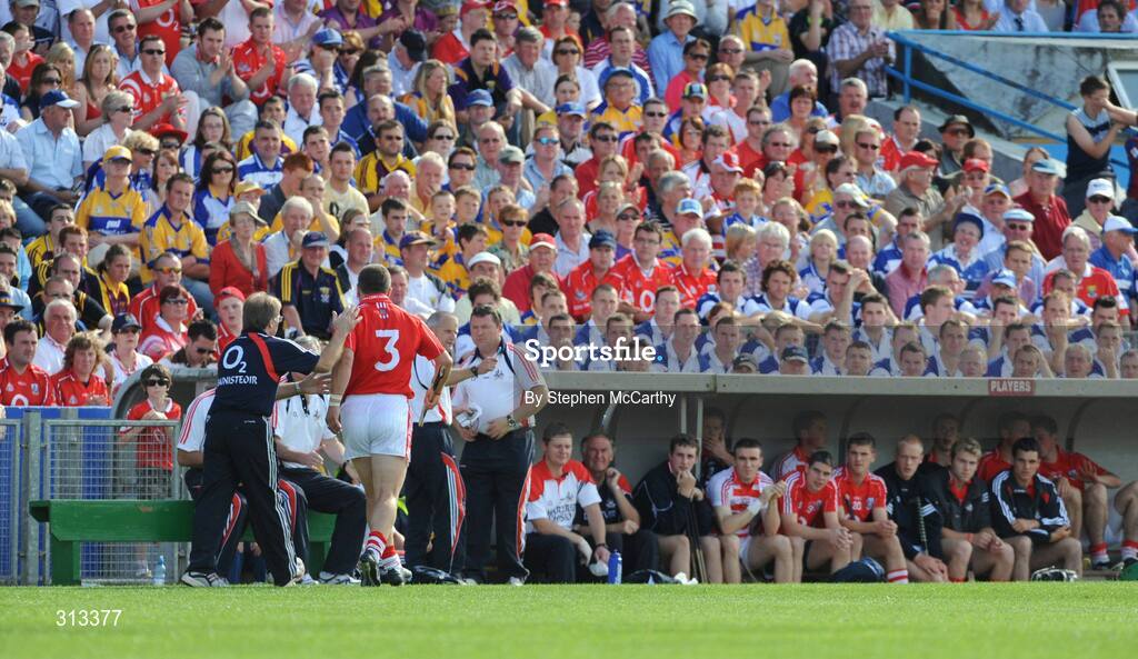 27 July 2008; Cork full-back Diarmuid O'Sullivan with manager Gerald McCarthy after being substituted. GAA Hurling All-Ireland Senior Championship Quarter-Final, Clare v Cork, Semple Stadium, Thurles, Co. Tipperary. Picture credit: Stephen McCarthy / SPORTSFILE