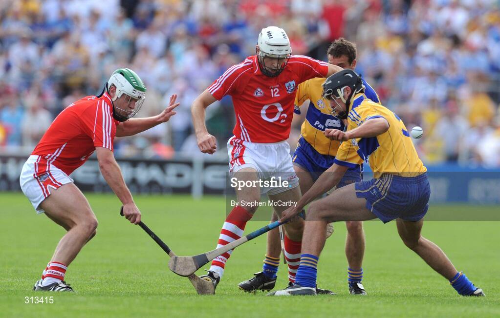 27 July 2008; Patrick Cronin, right, and Niall McCarthy, Cork, in action against Brendan Bolger, right, and Brian O'Connell, Clare. GAA Hurling All-Ireland Senior Championship Quarter-Final, Clare v Cork, Semple Stadium, Thurles, Co. Tipperary. Picture credit: Stephen McCarthy / SPORTSFILE