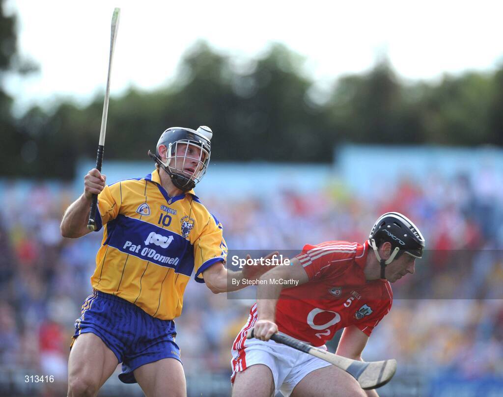 27 July 2008; Tony Carmody, Clare, in action against John Gardiner, Cork. GAA Hurling All-Ireland Senior Championship Quarter-Final, Clare v Cork, Semple Stadium, Thurles, Co. Tipperary. Picture credit: Stephen McCarthy / SPORTSFILE