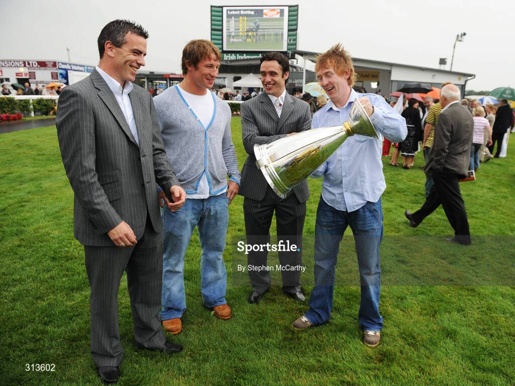 28 July 2008; HRI ambassador Hector Ó hEochagáin, far right, with Galway footballer Padraic Joyce, left, Munster hooker Jerry Flannery, Galway hurler Alan Kerins, right, and the Heiniken Cup during the opening day of the Galway Racing Festival. Galway Racing Fesitval - Monday, Ballybrit, Galway. Picture credit: Stephen McCarthy / SPORTSFILE