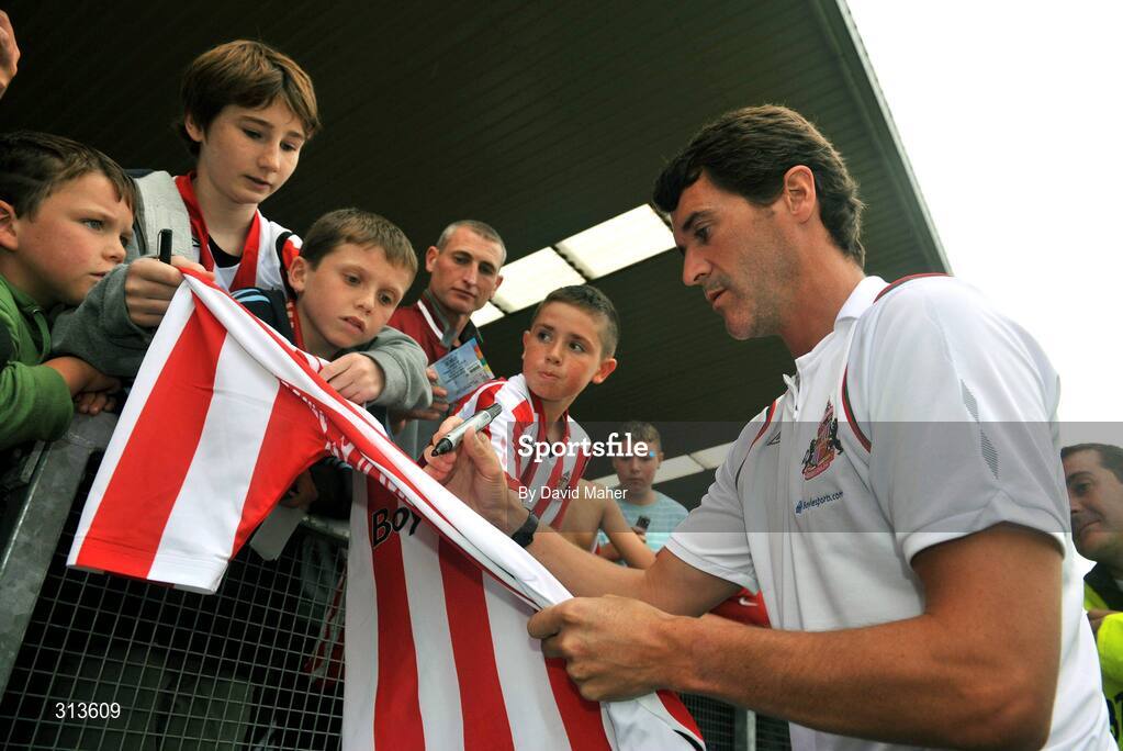28 July 2008; Sunderland manager Roy Keane signs autographs before the start of the game. Pre-season friendly, Cobh Ramblers v Sunderland, Turners Cross, Cork. Picture credit: David Maher / SPORTSFILE