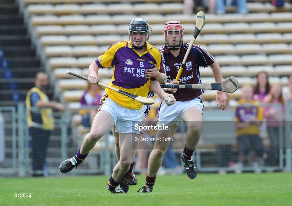 27 July 2008; Shane Tomkins, Wexford, is tackled by Gerard O'Halloran, left, and Donal Cooney, Galway. ESB GAA Hurling All Ireland Minor Championship Quarter-Final, Wexford v Galway, Semple Stadium, Thurles, Co. Tipperary. Picture credit: Stephen McCarthy / SPORTSFILE