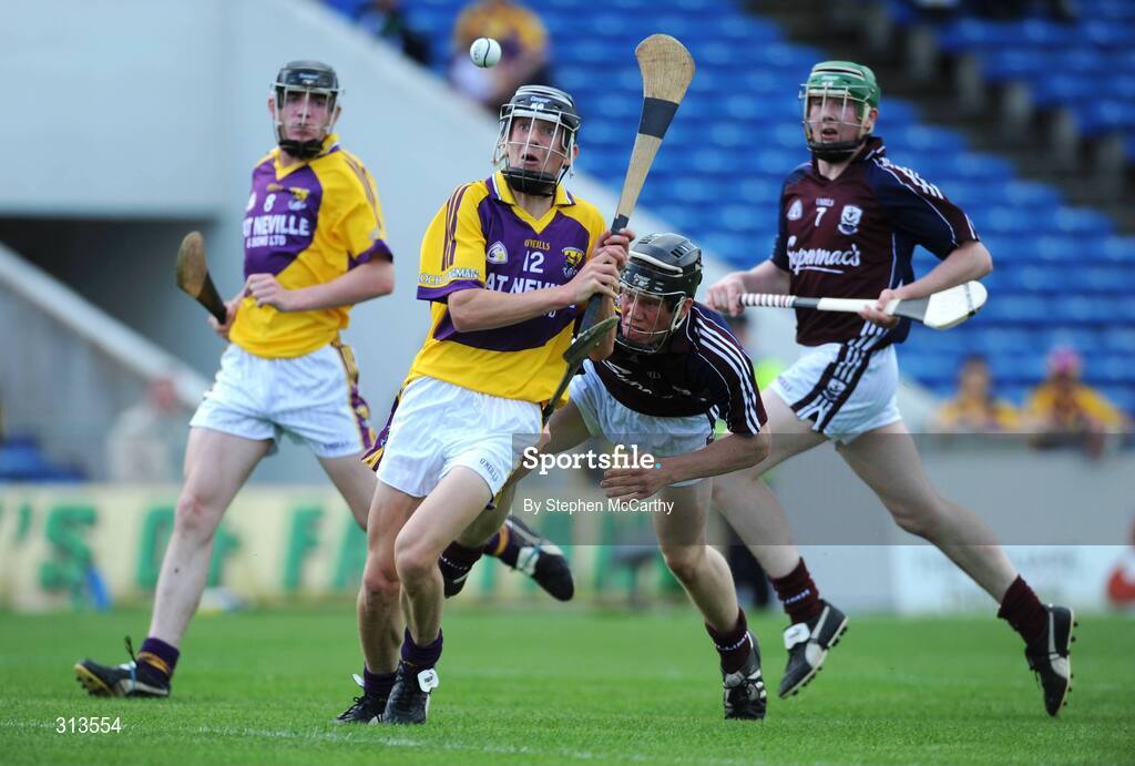 27 July 2008; Liam Og McGovern, Wexford, get his shot away despite the attention of Declan Connolly, Galway. ESB GAA Hurling All Ireland Minor Championship Quarter-Final, Wexford v Galway, Semple Stadium, Thurles, Co. Tipperary. Picture credit: Stephen McCarthy / SPORTSFILE