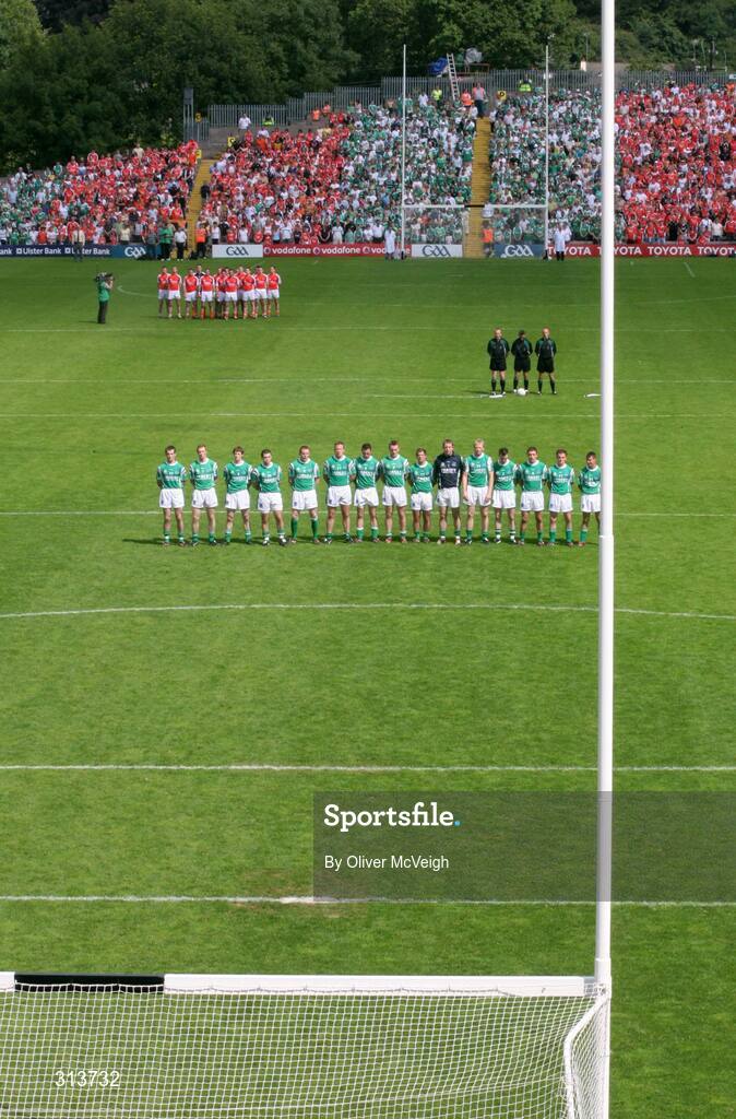 27 July 2008; The Armagh and Fermanagh teams stand for the national anthem. GAA Football Ulster Senior Championship Final replay, Armagh v Fermanagh, St Tighearnach's Park, Clones, Co. Monaghan. Picture credit: Oliver McVeigh / SPORTSFILE *** Local Caption *** S0807107 Armagh v Fermanagh OMcV