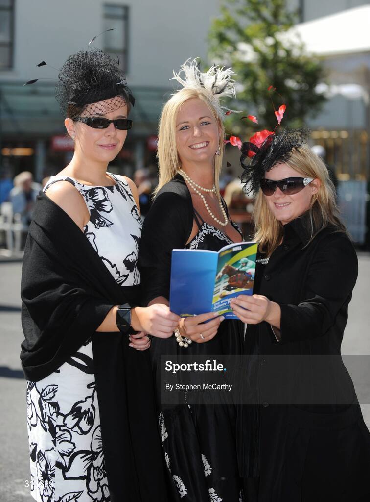 30 July 2008; Racegoers, from left, Elaine Murray, from Kildare, Kim Tully, from Carlow, and Olwyn Eivers, from Wicklow, during the third day of the Galway Racing Festival. Galway Racing Festival - Wednesday, Ballybrit, Galway. Picture credit: Stephen McCarthy / SPORTSFILE
