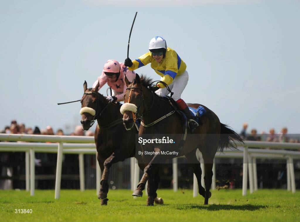 30 July 2008; Andrew Leigh celebrates, onboard Desert Abbey, as he races clear of eventual second Go Native, with Niall Madden up, on their way to winning the William Hill In Ireland Novice Hurdle. Galway Racing Festival, Ballybrit, Galway. Picture credit: Stephen McCarthy / SPORTSFILE