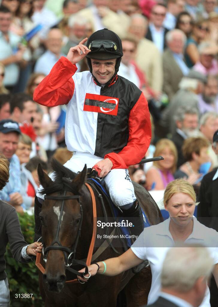 30 July 2008; Jockey Ruby Walsh celebrates as he enters the parade ring after winning the William Hill Galway Plate on Oslot. Galway Racing Festival, Ballybrit, Galway. Picture credit: Stephen McCarthy / SPORTSFILE