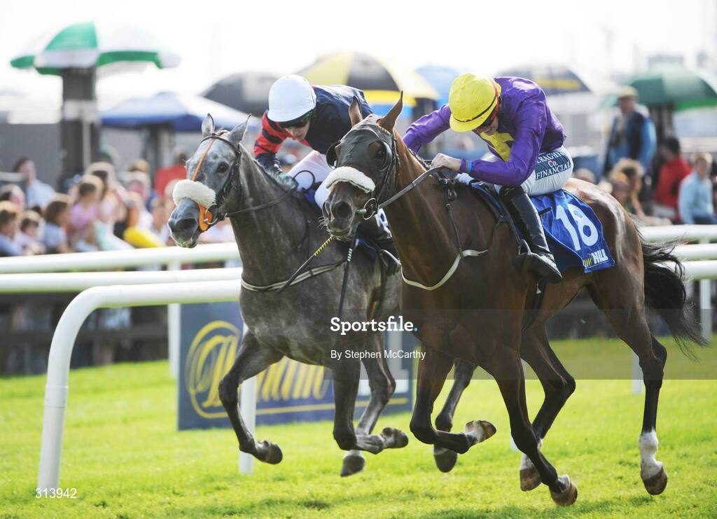 30 July 2008; Lady Alicia, with Matthew O'Connor up, 18, cross the line to claim the William Hill Irish Sports Book Maiden, from eventual second Zarinava, with Emmet Mullins up. Galway Racing Festival - Wednesday, Ballybrit, Galway. Picture credit: Stephen McCarthy / SPORTSFILE