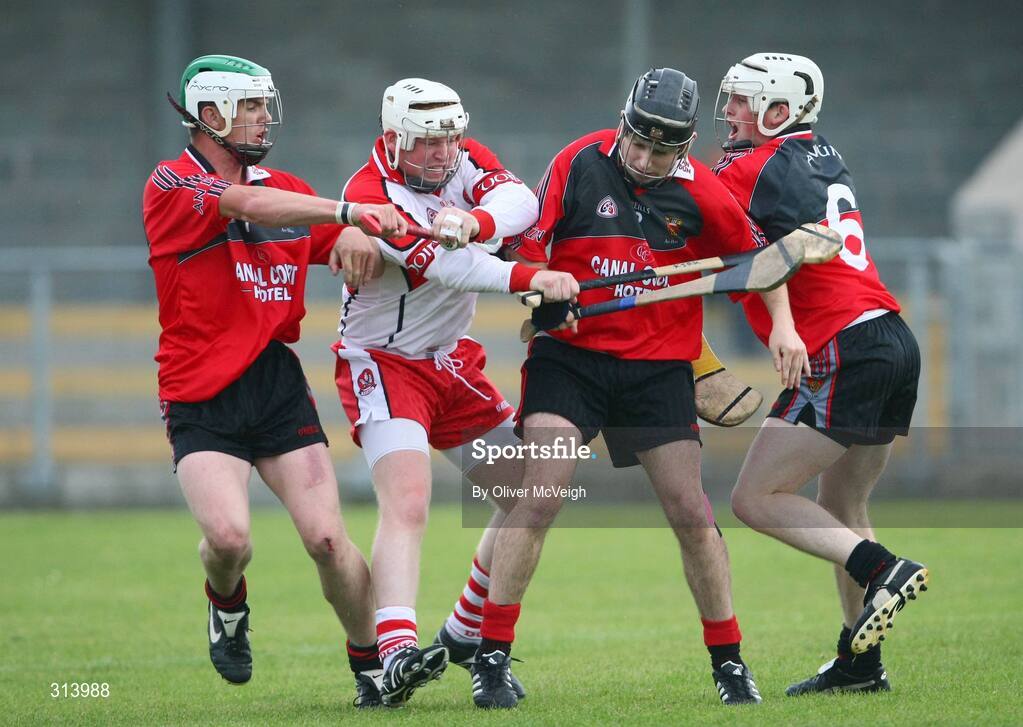 30 July 2008; Michael Kirkpatrick, Derry, in action against Michael McCartan, Sean Ennis and Brian Bell, Down. Bord Gais Ulster U21 Hurling Championship, Down v Derry, Ballycran, Co. Down. Picture credit: Oliver McVeigh / SPORTSFILE