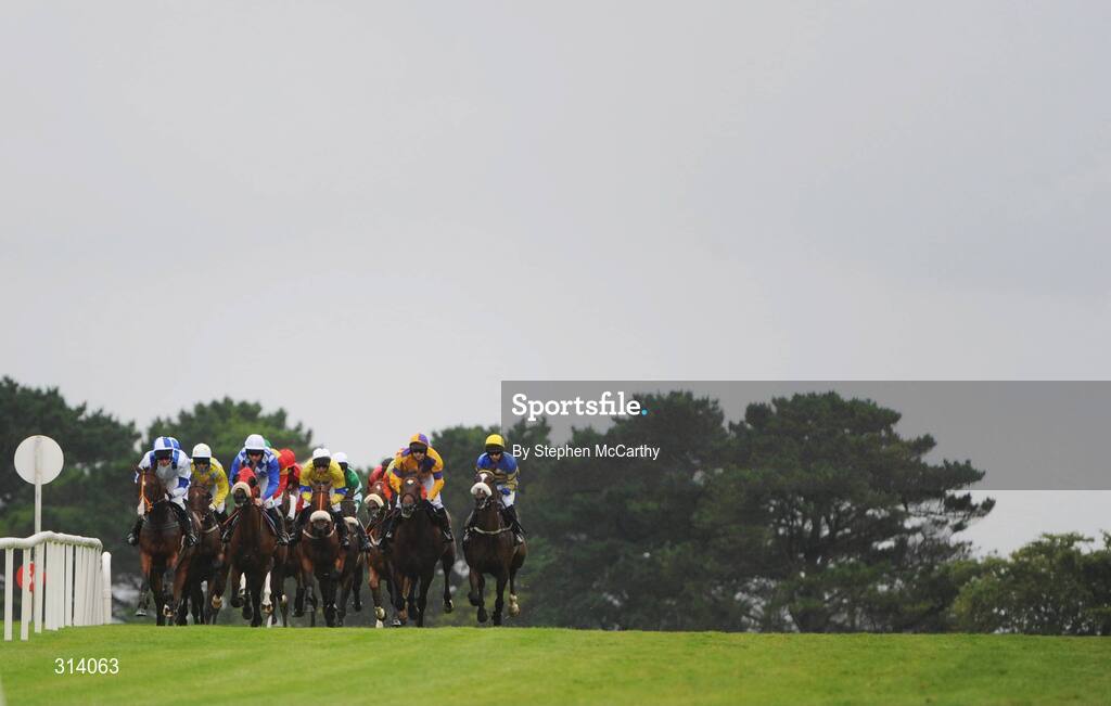 31 July 2008; A general view of the runners and riders during the St. James's Gate Novice Hurdle. Galway Racing Festival - Thursday, Ballybrit, Co. Galway. Picture credit: Stephen McCarthy / SPORTSFILE
