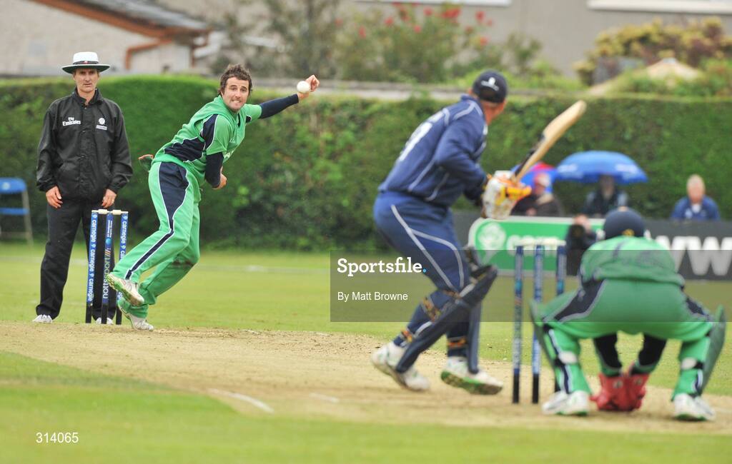 31 July 2008; Kyle McCallan, Ireland, takes the wicket of Scotland captain Ryan Watson watched by test match umpire Billy Bowden from New Zealand. Ireland v Scotland, One Day International, Clontarf Cricket Club, Dublin. Picture credit: Matt Browne / SPORTSFILE