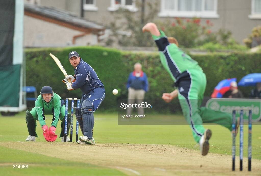 31 July 2008; Scotland captain Ryan Watson in action on his way to 50, takes the bowel of Kevin O'Brien, Ireland as wicketkeeper Niall O'Brien watches the ball. Ireland v Scotland, One Day International, Clontarf Cricket Club, Dublin. Picture credit: Matt Browne / SPORTSFILE