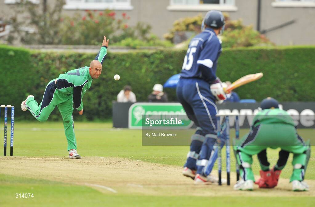 31 July 2008; Andre Botha, Ireland, in action against Colin Smith, Scotland, watched by wicketkeeper Niall O'Brien during the match. Ireland v Scotland, One Day International, Clontarf Cricket Club, Dublin. Picture credit: Matt Browne / SPORTSFILE