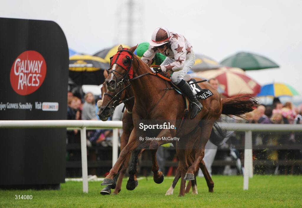 31 July 2008; Indian Pace, with Paul Townend up, on their way to winning the Guinness Galway Hurdle Handicap, from Eagle's Pass, with Paddy Flood up, left, and third place Northern Alliance, with Ruby Walsh up, hidden. Galway Racing Festival - Thursday, Ballybrit, Co. Galway. Picture credit: Stephen McCarthy / SPORTSFILE