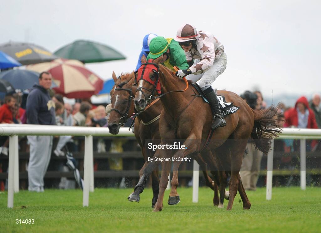 31 July 2008; Indian Pace, with Paul Townend up, on their way to winning the Guinness Galway Hurdle Handicap, from Eagle's Pass, with Paddy Flood up, left, and third place Northern Alliance, with Ruby Walsh up, hidden. Galway Racing Festival, Ballybrit, Co. Galway. Picture credit: Stephen McCarthy / SPORTSFILE