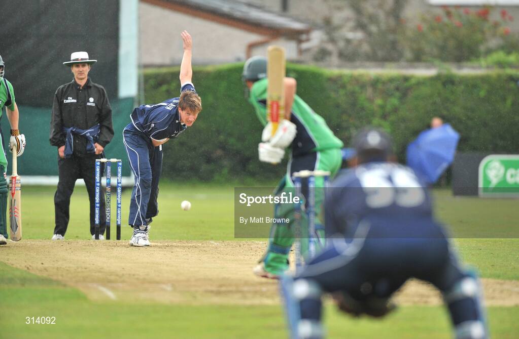 31 July 2008; John Blain, Scotland, bowls out William Porterfield, Ireland. Ireland v Scotland, One Day International, Clontarf Cricket Club, Dublin. Picture credit: Matt Browne / SPORTSFILE