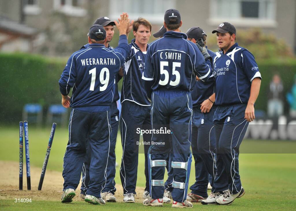 31 July 2008; John Blain, centre, Scotland, is congratulated by his team-mates after bowling out William Porterfield, Ireland. Ireland v Scotland, One Day International, Clontarf Cricket Club, Dublin. Picture credit: Matt Browne / SPORTSFILE