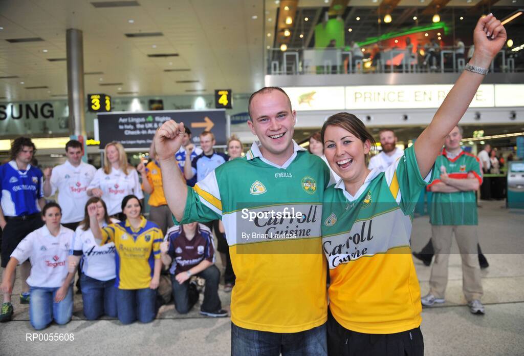 25 July 2008; Ciaran Kenny, from Tullamore, and Michelle Mahon, from Tullamore, at Dublin Airport before travelling to New York to take part in the New York City Half Marathon. Team NY32, which is made up of representatives from counties all over Ireland are on their way to the New York City Half Marathon to help raise funds for Special Olympics Ireland to recruit more athletes into the programme around the country. Dublin Airport, Dublin. Picture credit: Brian Lawless / SPORTSFILE