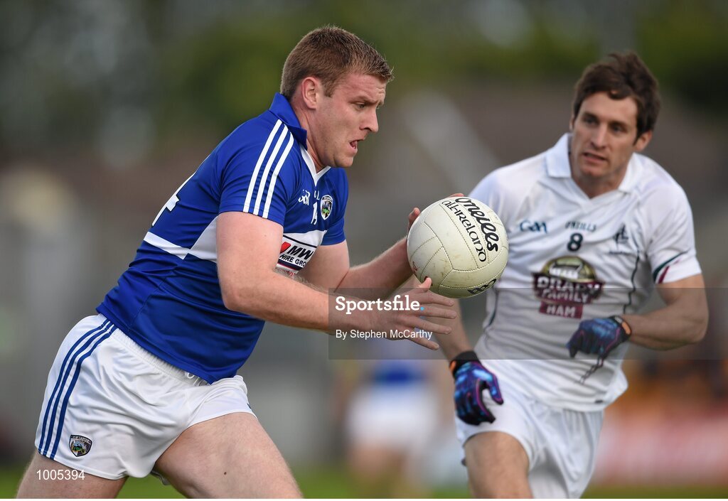 6 June 2015; Donal Kingston, Laois, in action against Gary White, Kildare. Leinster GAA Football Senior Championship Quarter-Final, Kildare v Laois. O'Connor Park, Tullamore, Co. Offaly. Picture credit: Stephen McCarthy / SPORTSFILE