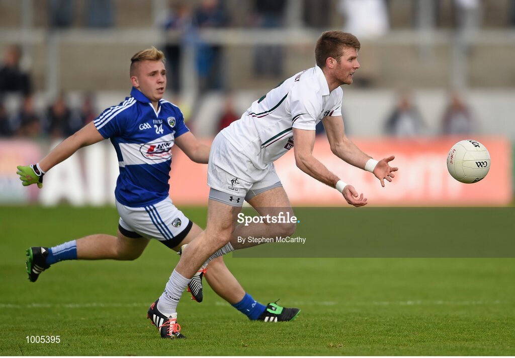 6 June 2015; Ciaran Fitzgerald, Kildare, in action against Tom Shiel, Laois. Leinster GAA Football Senior Championship Quarter-Final, Kildare v Laois. O'Connor Park, Tullamore, Co. Offaly. Picture credit: Stephen McCarthy / SPORTSFILE