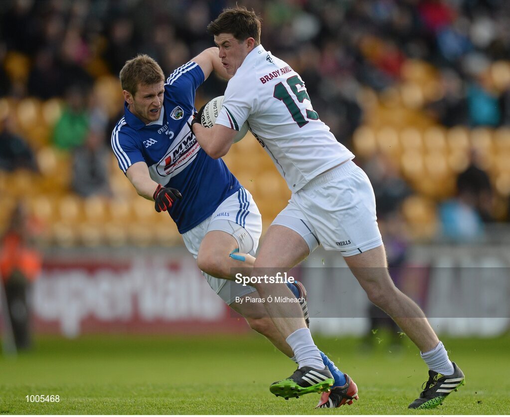 6 June 2015; Padraig Fogarty, Kildare, in action against Mark Timmons, Laois. Leinster GAA Football Senior Championship Quarter-Final, Kildare v Laois. O'Connor Park, Tullamore, Co. Offaly. Picture credit: Piaras Ó Mídheach / SPORTSFILE
