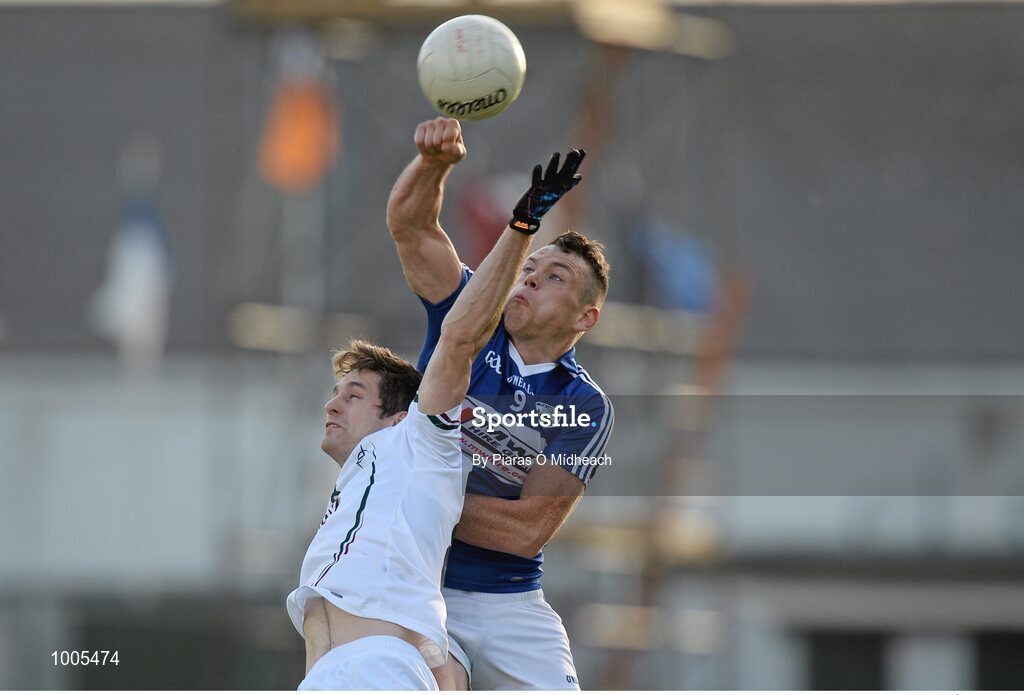 6 June 2015; John O'Loughlin, Laois, in action against Gary White, Kildare. Leinster GAA Football Senior Championship Quarter-Final, Kildare v Laois. O'Connor Park, Tullamore, Co. Offaly. Picture credit: Piaras Ó Mídheach / SPORTSFILE
