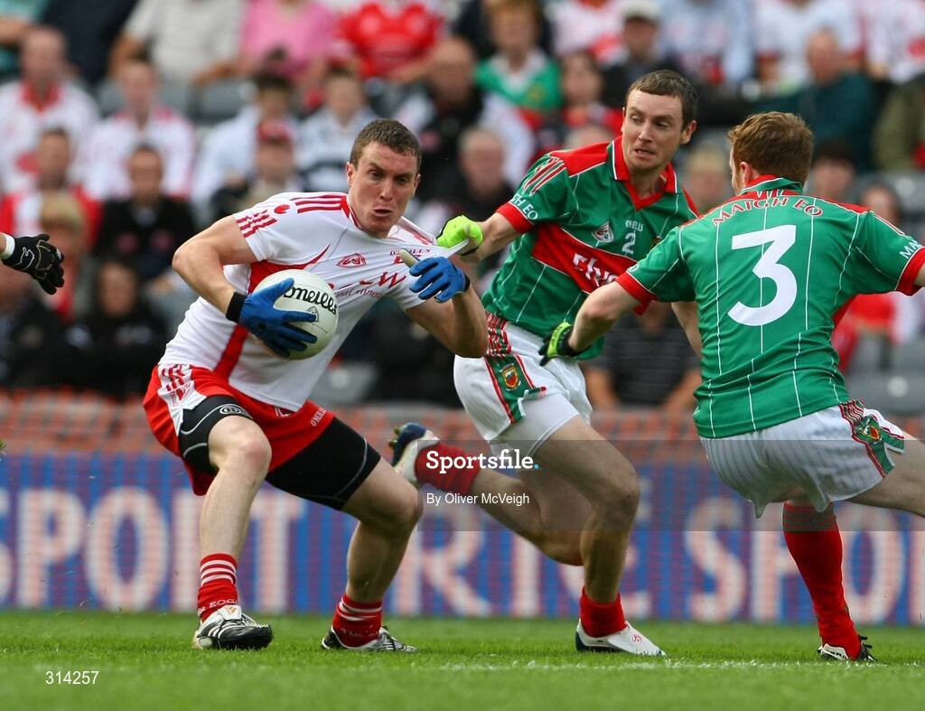 2 August 2008; Tommy McGuigan, Tyrone, in action against Keith Higgins, Mayo. All-Ireland Senior Football Championship Qualifier, Round 3, Tyrone v Mayo, Croke Park, Dublin. Picture credit: Oliver McVeigh / SPORTSFILE