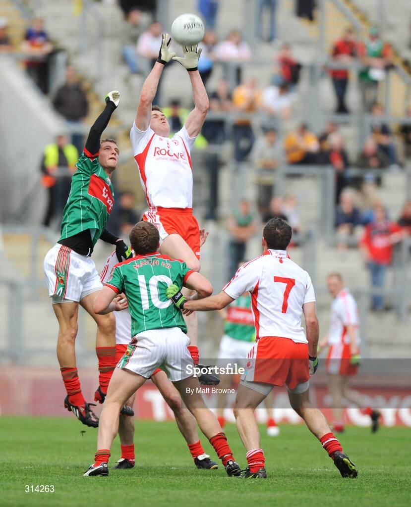 2 August 2008; Enda McGinley and Philip Jordan, 7, Tyrone, in action against Tom Parsons, left, and Andy Moran, Mayo. All-Ireland Senior Football Championship Qualifier, Round 3, Tyrone v Mayo, Croke Park, Dublin. Picture credit: Matt Browne / SPORTSFILE