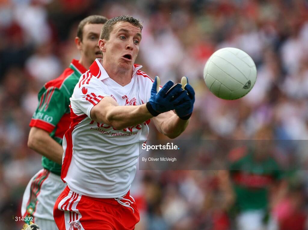 2 August 2008; Tommy McGuigan, Tyrone, in action against Aidan Higgins, Mayo. All-Ireland Senior Football Championship Qualifier, Round 3, Tyrone v Mayo, Croke Park, Dublin. Picture credit: Oliver McVeigh / SPORTSFILE