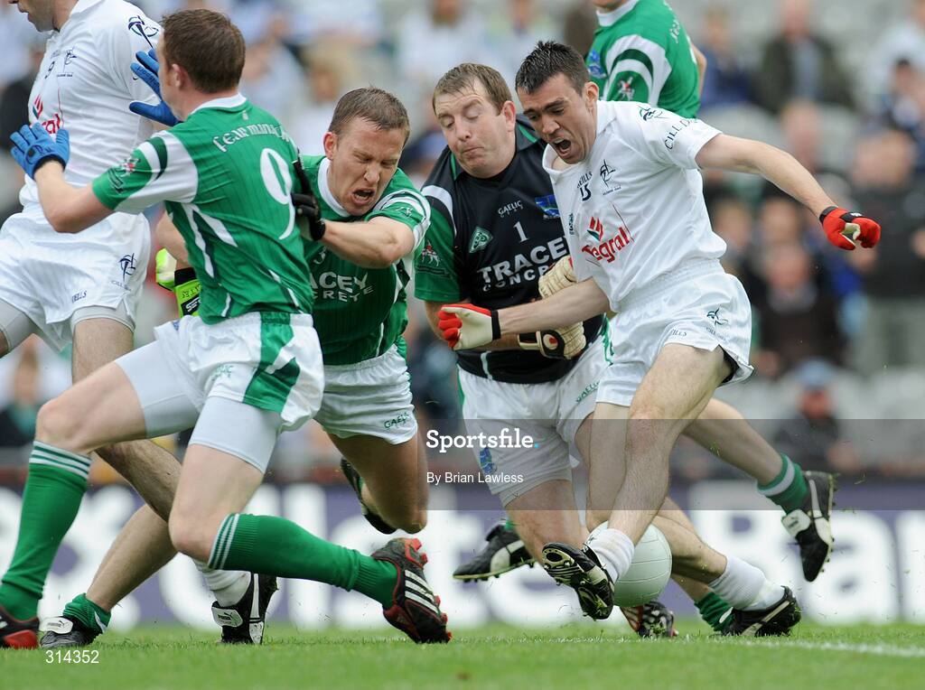 3 August 2008; John Doyle, Kildare, is tackled by Fermanagh goalkeeper Ronan Gallagher, which results in a penalty. The penalty taken by Kildare's John Doyle was saved by Fermanagh's Peter Sherry. All-Ireland Senior Football Championship Qualifier, Round 3, Fermanagh v Kildare, Croke Park, Dublin. Picture credit: Brian Lawless / SPORTSFILE