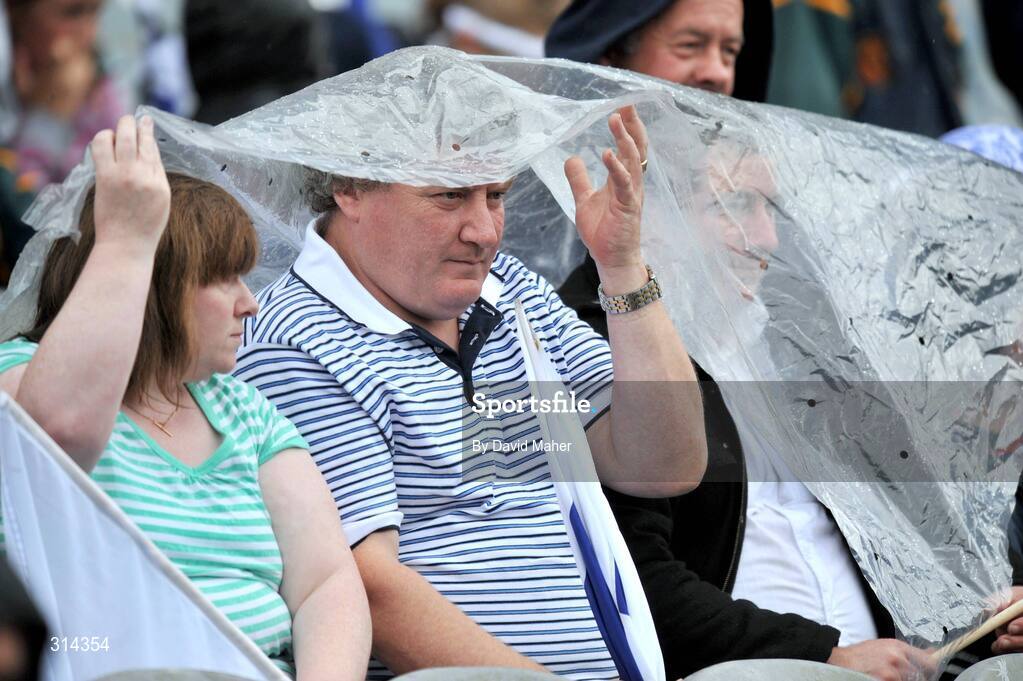 3 August 2008; Spectators take cover from the rain during the Kildare v Fermanagh game. All-Ireland Senior Football Championship Qualifier, Round 3, Fermanagh v Kildare, Croke Park, Dublin. Picture credit: David Maher / SPORTSFILE