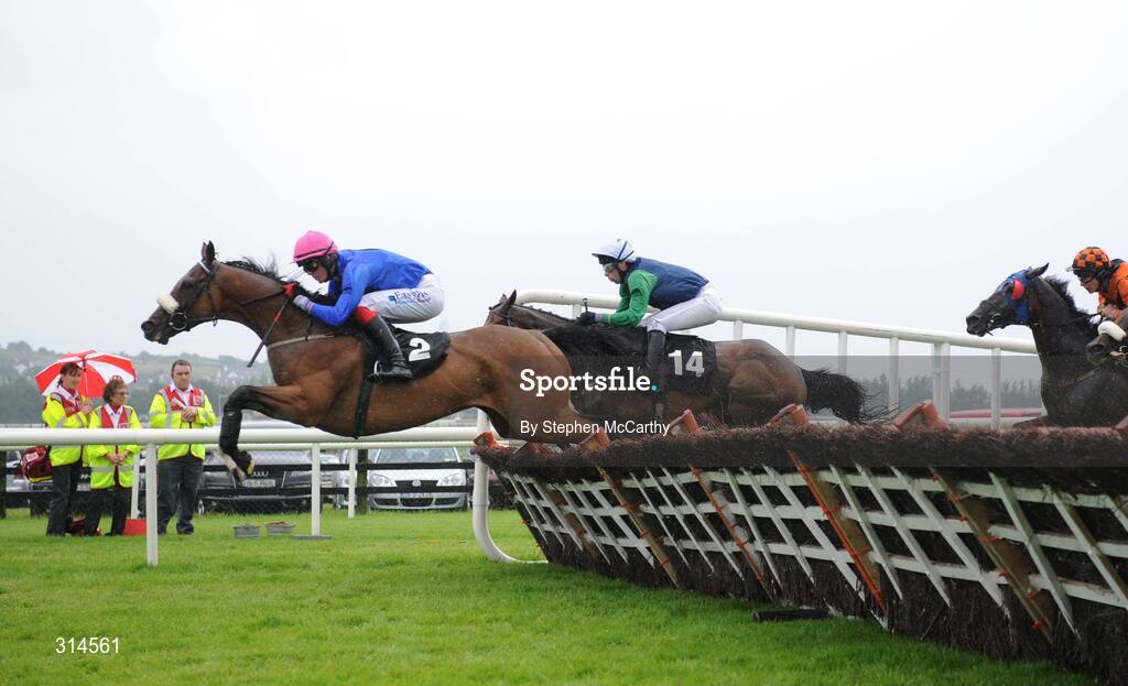 28 July 2008; Little Eye, with Robbie McNamara up, jumps ahead of On Your Way, with Thomas Doyle up, during the GPT Dublin Handicap Hurdle. Galway Racing Fesitval - Monday, Ballybrit, Galway. Picture credit: Stephen McCarthy / SPORTSFILE