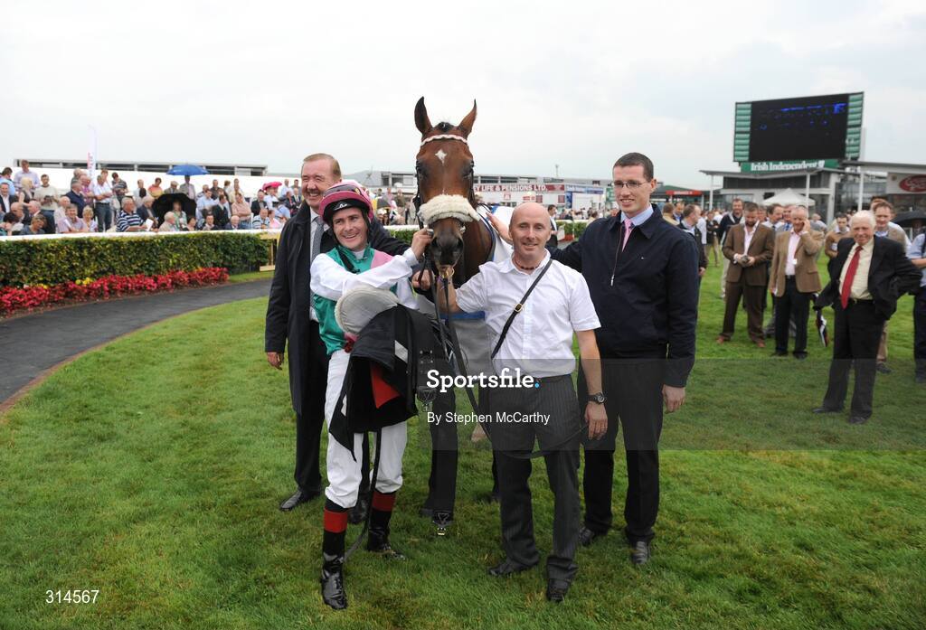 28 July 2008; Pat Smullen with his mount Broad Meaning after winning the GPT Access Equipment EBF Maiden Stakes with trainer Dermot Weld, left, and Kris Weld, right. Galway Racing Fesitval - Monday, Ballybrit, Galway. Picture credit: Stephen McCarthy / SPORTSFILE
