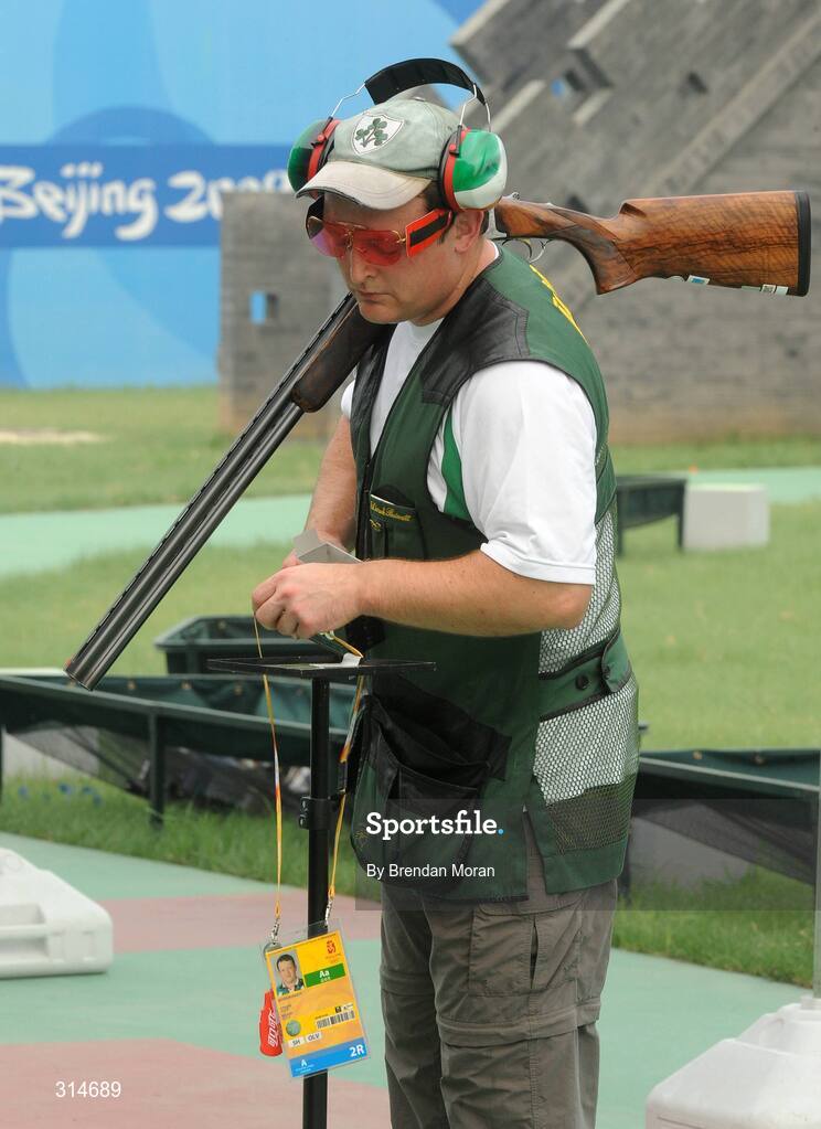 6 August 2008; Ireland's Derek Burnett collects his accreditation after a practice session. Beijing 2008 - Games of the XXIX Olympiad, Beijing Shooting Range, Xiangshan nan Road, Haidian District, Beijing, China. Picture credit: Brendan Moran / SPORTSFILE