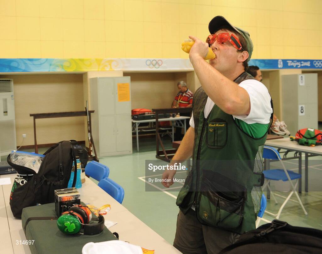 6 August 2008; Ireland's Derek Burnett takes a last drink before a training session. Beijing 2008 - Games of the XXIX Olympiad, Beijing Shooting Range, Xiangshan nan Road, Haidian District, Beijing, China. Picture credit: Brendan Moran / SPORTSFILE