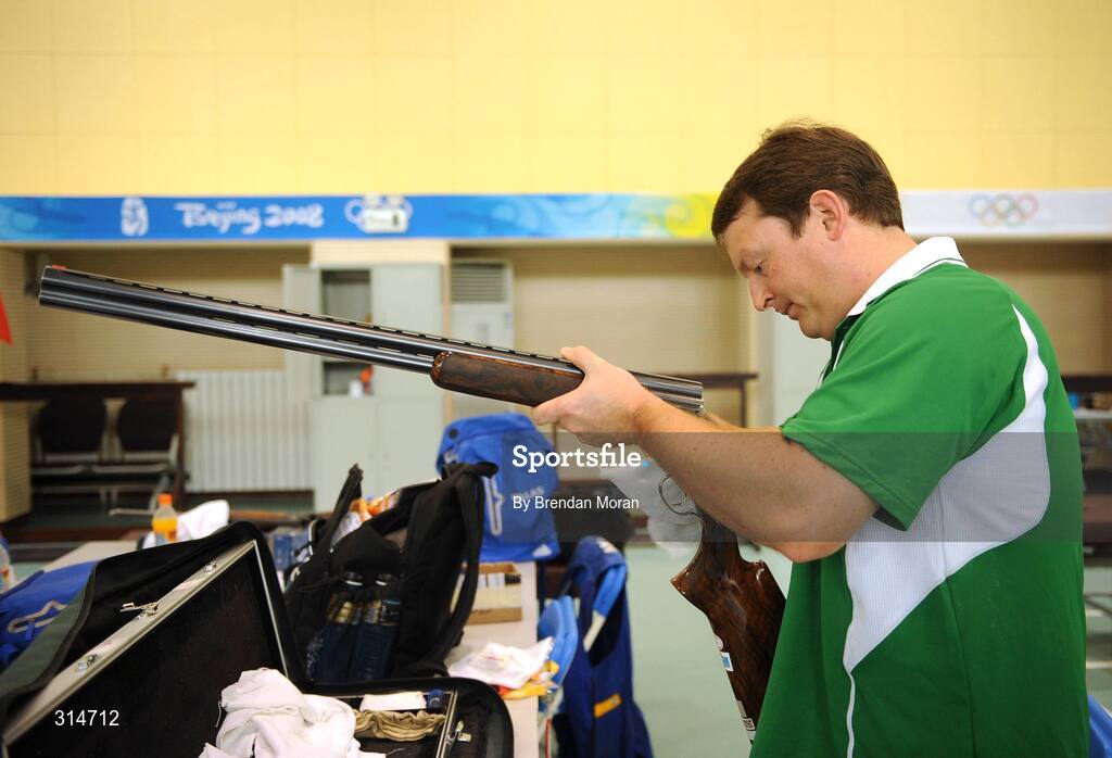 6 August 2008; Ireland's Derek Burnett finalises his preparations before a training session. Beijing 2008 - Games of the XXIX Olympiad, Beijing Shooting Range, Xiangshan nan Road, Haidian District, Beijing, China. Picture credit: Brendan Moran / SPORTSFILE