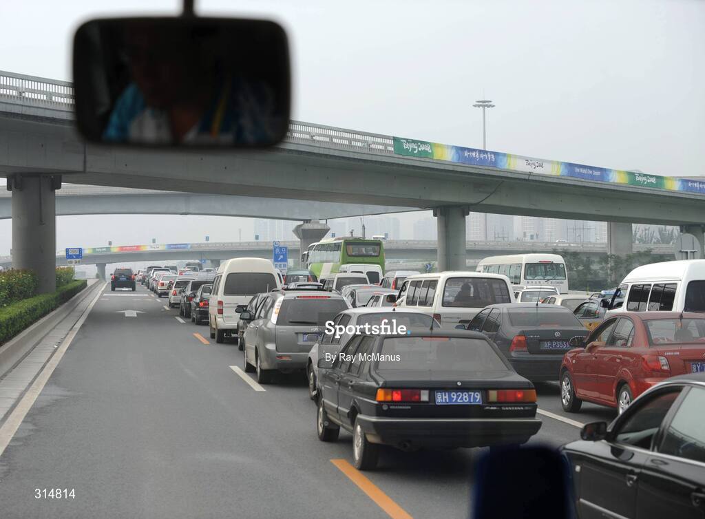 7 August 2008; Motorists wait for clearance to move during heavy traffic on a highway outside the city. The left lane is reserved for Games related traffic. Beijing 2008 - Games of the XXIX Olympiad, Beijing, China. Picture credit: Ray McManus / SPORTSFILE