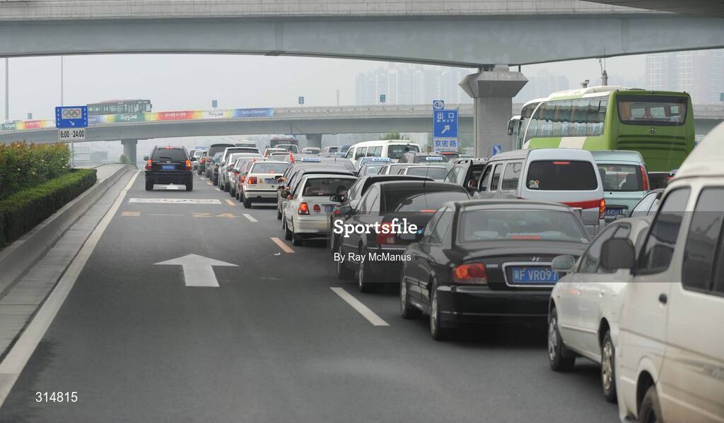 7 August 2008; Motorists wait for clearance to move during heavy traffic on a highway outside the city. The left lane is reserved for Games related traffic. Beijing 2008 - Games of the XXIX Olympiad, Beijing, China. Picture credit: Ray McManus / SPORTSFILE